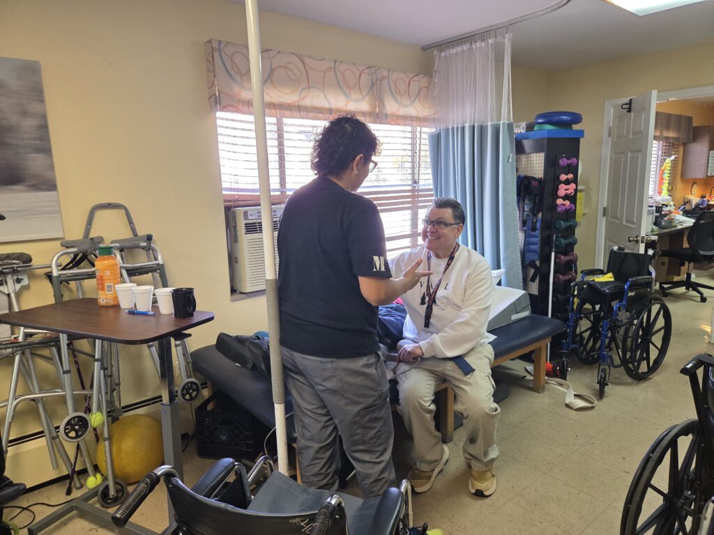 Malissa Sanchez consulting with a patient