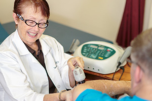 reovista-300x200-5 rehab therapist with an elderly woman