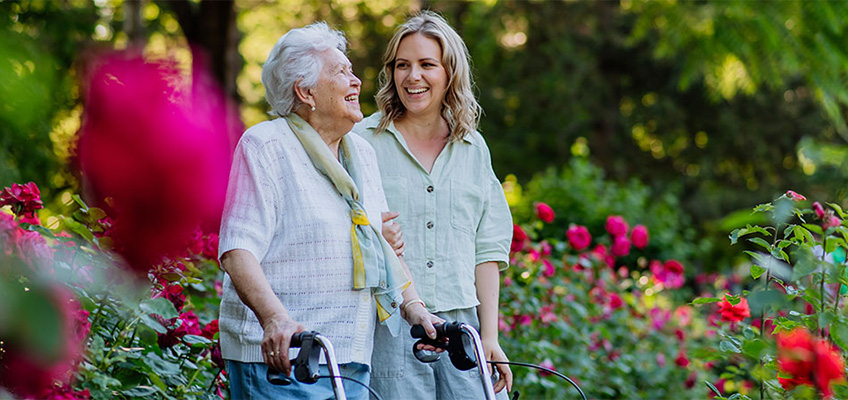 2 women in a garden