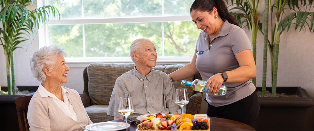 An elderly couple sitting together